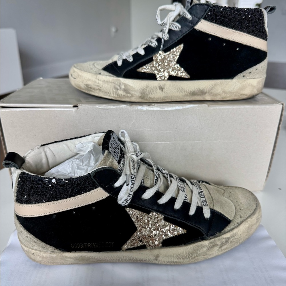 Golden Goose Black and Gold Star Sneakers